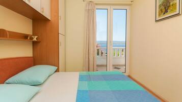 3 habitaciones, tabla de planchar con plancha y cuna de viaje