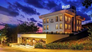 A hotel with a prominent 'Byon' sign, a modern architectural style, and a well-lit entrance area. - Byon Hotel Şile (Sile)