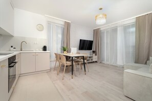 Apartamento, 2 quartos, sacada | Sala de estar