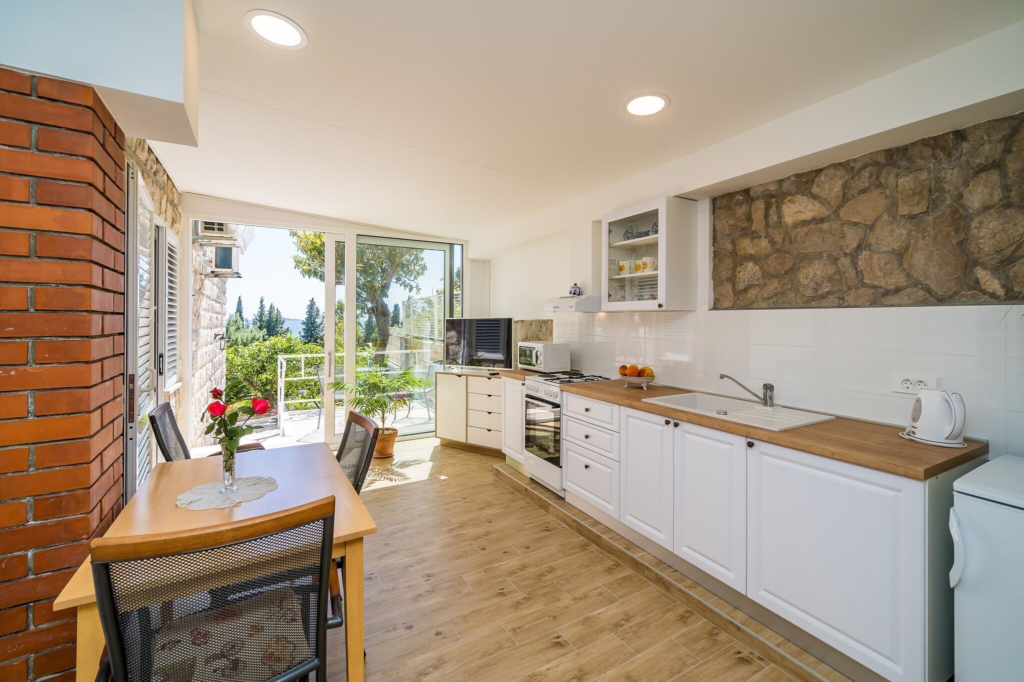 Fridge, oven, stovetop, dining tables