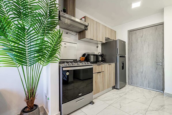 Fridge, microwave, coffee/tea maker, toaster