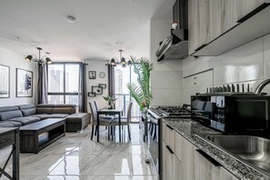 Fridge, microwave, coffee/tea maker, toaster