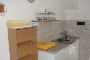Refrigerador y parrilla de estufa
