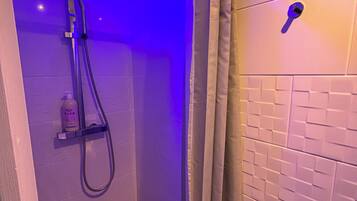 Hair dryer, towels, soap, shampoo