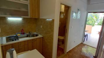 Fridge, stovetop, dining tables