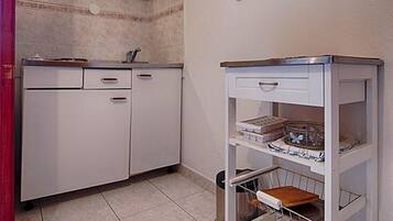Refrigerador, parrilla de estufa y tostadora