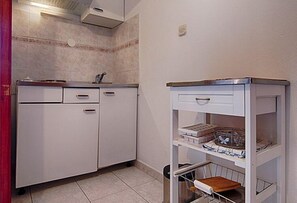 Refrigerador, parrilla de estufa y tostadora 