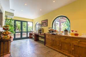 Enjoy cooking in this well-equipped kitchen with a large island counter and plenty of natural light.
