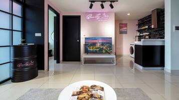 Superior Apartment, 2 Bedrooms, Kitchen, City View | Living area | 35-inch TV with cable channels