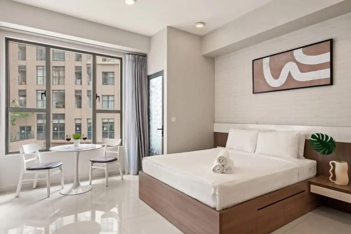 Desk, laptop workspace, free WiFi, bed sheets