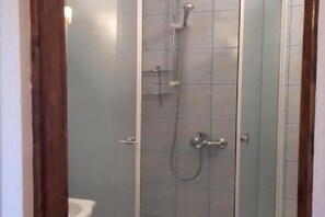 Regadera y secadora de cabello