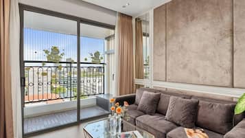 Apartemen Superior, 2 kamar tidur, dapur, pemandangan kota | Area keluarga | Smart TV