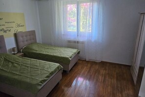 2 dormitorios, tabla de planchar con plancha, wifi gratis