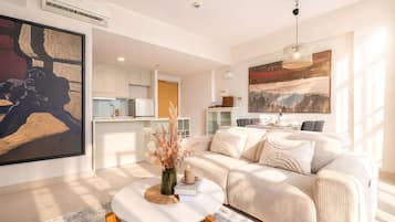 Superior Apartment, 2 Bedrooms, Kitchen, City View | Living area | 35-inch TV with cable channels