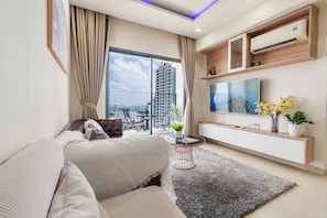 Superior Apartment, 3 Bedrooms, Kitchen, City View | Living area | 35-inch TV with cable channels