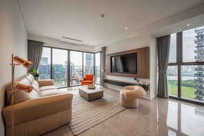 Superior Apartment, 3 Bedrooms, Kitchen, City View | Living area | 35-inch TV with cable channels - The Opera Residence - Pool & Sauna (Ho Chi Minh City)