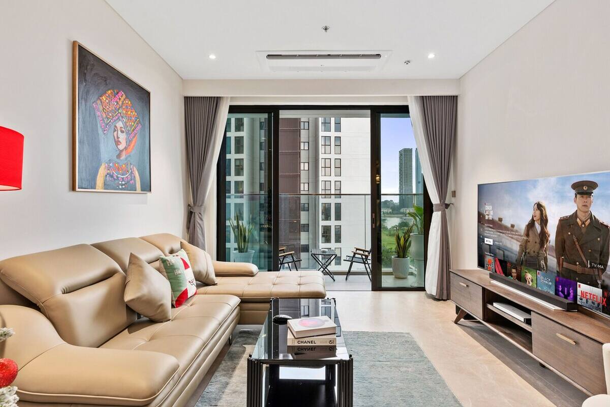 Apartamento superior, 3 quartos, cozinha, vista para a cidade | Área de estar | TV 35 polegadas com canais a cabo