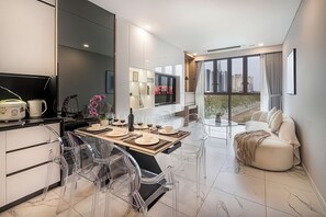 Superior Apartment, 3 Bedrooms, Kitchen, City View | Living area | 35-inch TV with cable channels