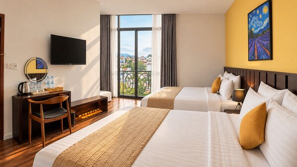 A hotel room with two beds, a TV, a desk with a chair, and a view of the city. -  Amory Stillus Collection Dalat (Xuan Huong - Da Lat)