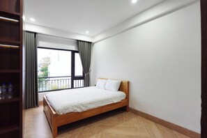 Deluxe Quadruple Room, Balcony, City View