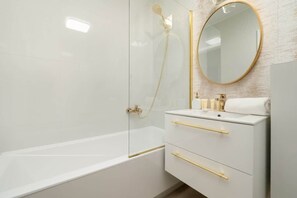 Shower, hair dryer, shampoo
