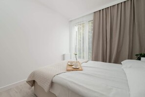 2 habitaciones, tabla de planchar con plancha, wifi y ropa de cama