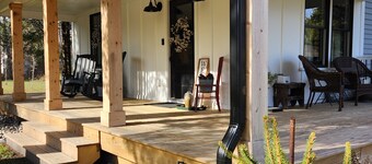 Charming 3-bedroom farmhouse on 20 acres located in rustic Corbin City. 