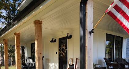 Charming 3-bedroom farmhouse on 20 acres located in rustic Corbin City.