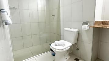 Shower, towels, soap, toilet paper
