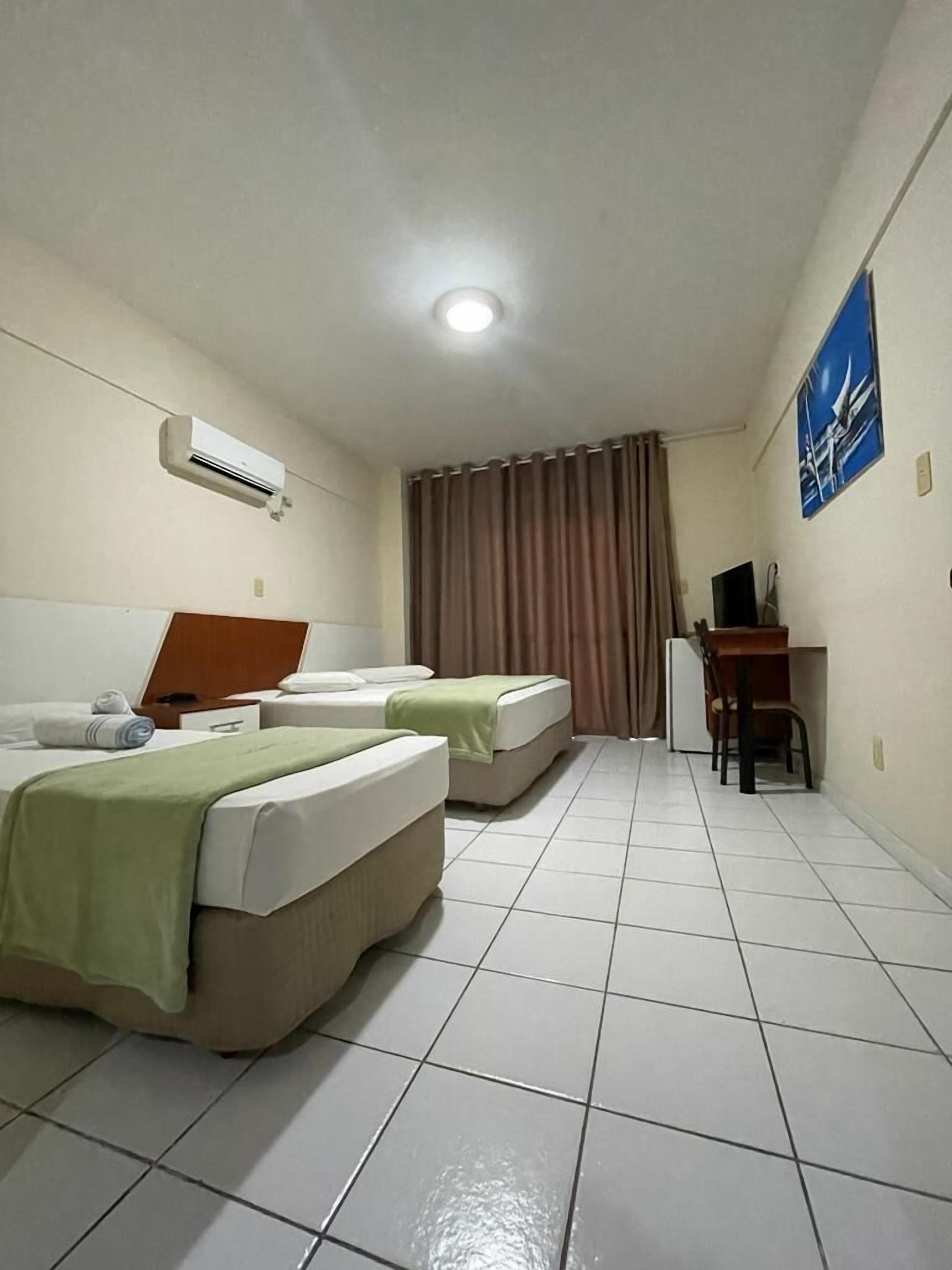 Standard Triple Room, Balcony | Desk, laptop workspace, blackout drapes, free WiFi
