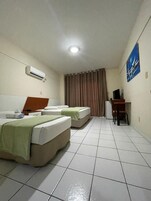 Standard Triple Room, Balcony | Desk, laptop workspace, blackout drapes, free WiFi