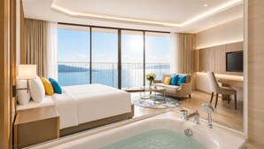Une chambre d’hôtel dotée d’un grand lit, d’un coin salon avec un canapé et des fauteuils, d’un bureau avec une chaise, d’une télévision et d’une baignoire.