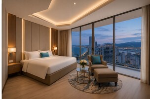 尊贵公寓式客房, 部分海景 | 埃及棉床单、高档床上用品、记忆海绵床垫、迷你吧