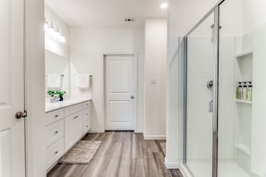 Shower, hair dryer, towels, soap