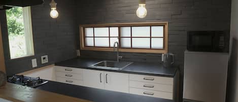 Fridge, microwave, cookware/dishes/utensils