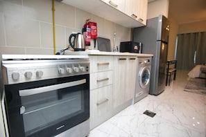 Fridge, microwave, oven, stovetop