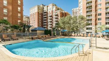 Seasonal outdoor pool, pool umbrellas, pool loungers