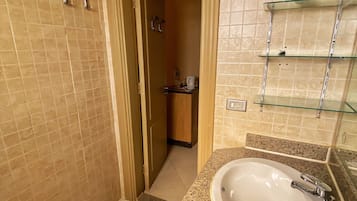 Shower, towels, soap, toilet paper