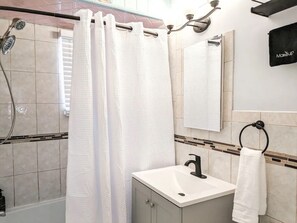 Hair dryer, towels, soap, shampoo