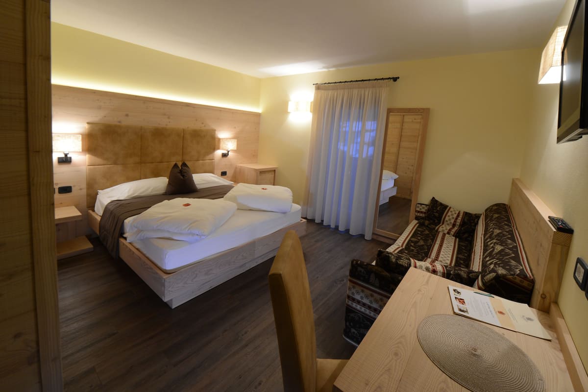 Een kluis op de kamer, gratis wifi, beddengoed