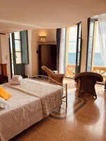 Superior Quadruple Room, Ensuite, Sea View | In-room safe, desk, cribs/infant beds, free WiFi