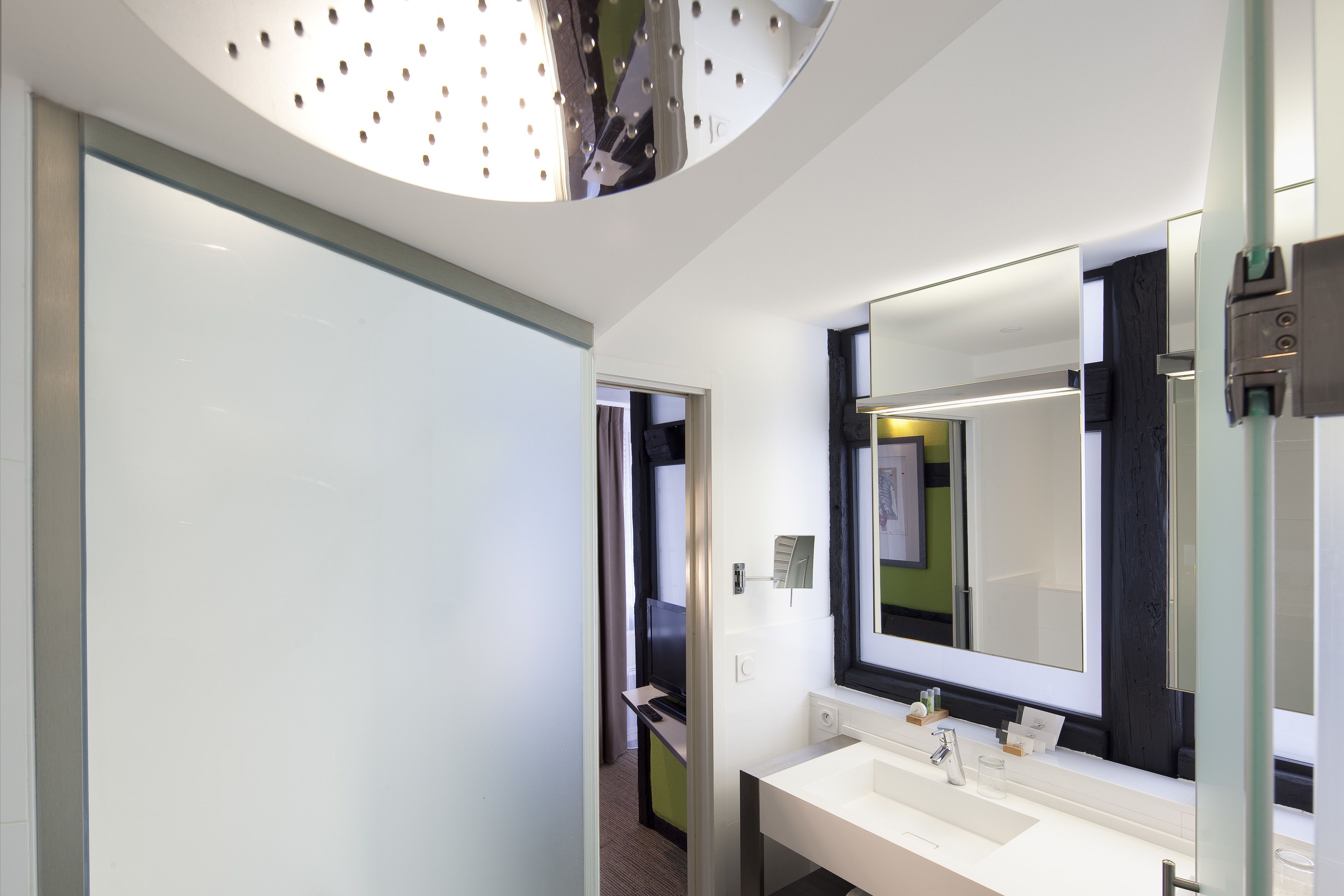 deluxe room | bathroom | shower, designer toiletries, hair dryer, bathrobes