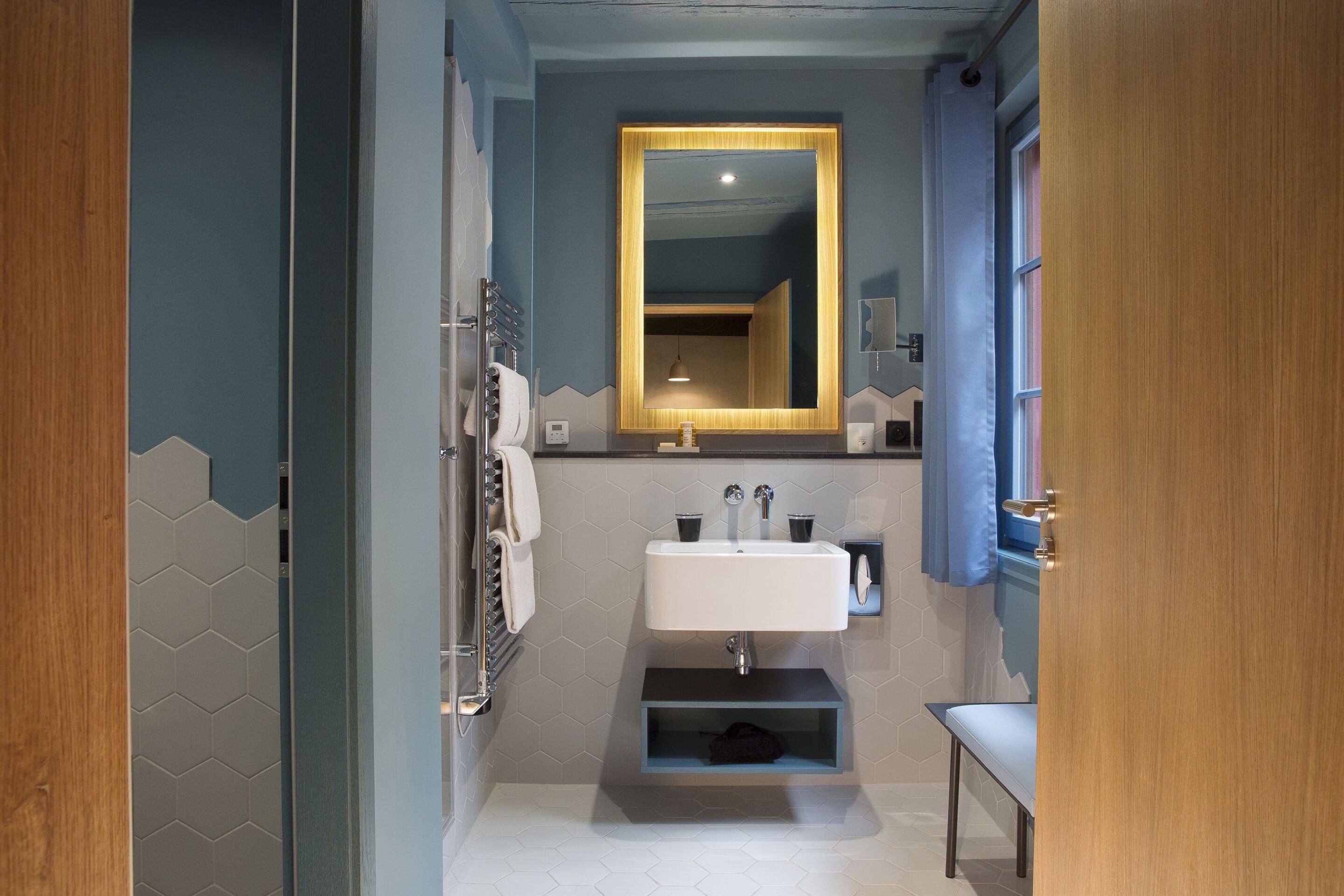 deluxe room | bathroom | shower, designer toiletries, hair dryer, bathrobes