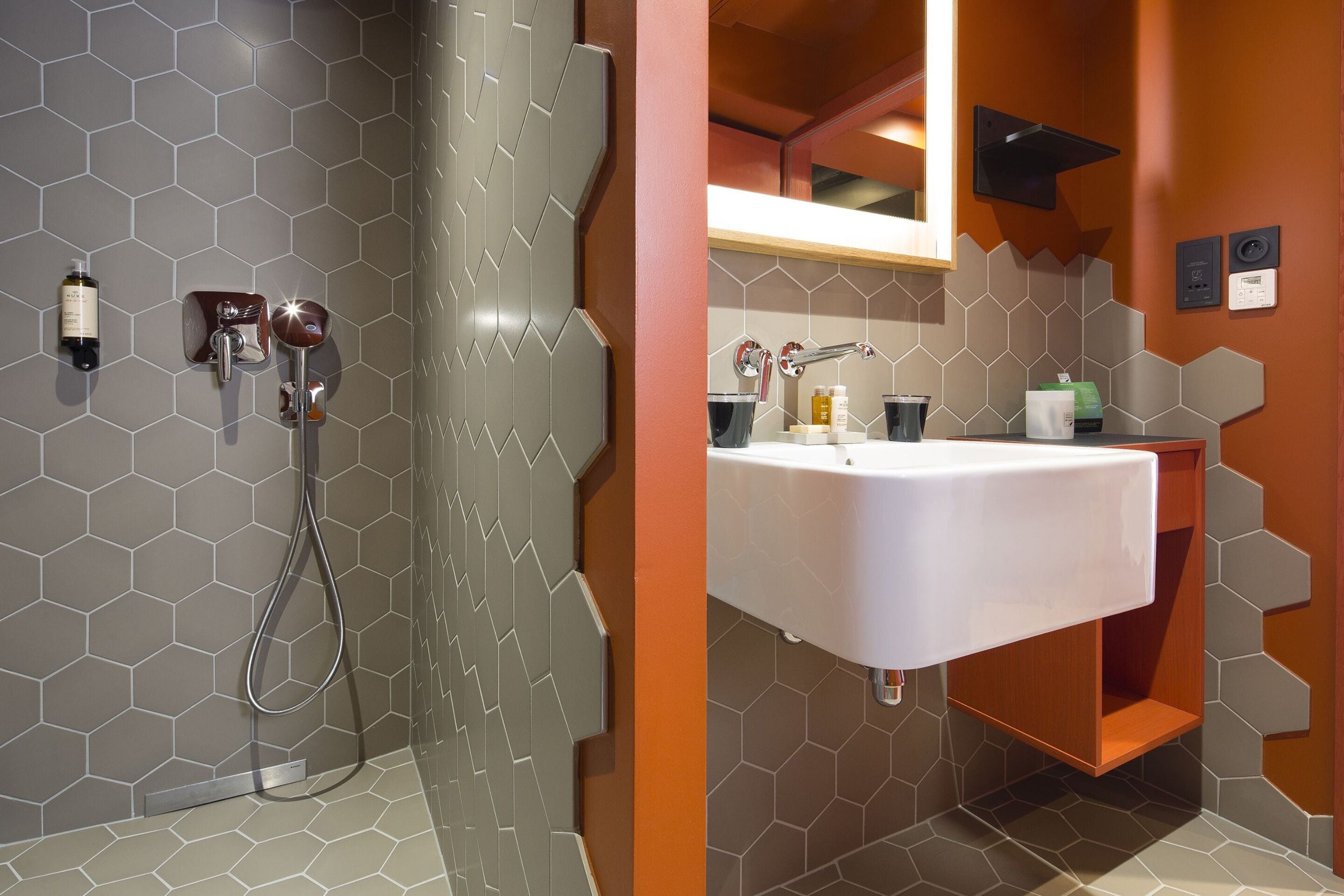 deluxe room | bathroom | shower, designer toiletries, hair dryer, bathrobes