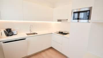 Apartemen, 2 kamar tidur | Dapur pribadi | Lemari es, microwave, kompor, dan mesin pembuat kopi/teh
