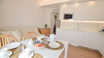 Apartment, 2 Bedrooms, Terrace | Living area | Flat-screen TV