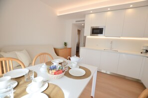 Apartment, 2 Bedrooms, Terrace | Living area | Flat-screen TV - Villa Phoenix (Riva del Garda)