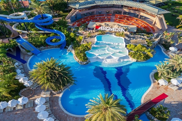 Indoor pool, seasonal outdoor pool, pool umbrellas, pool loungers
