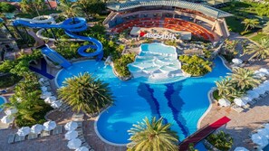 A resort with a large pool, a water slide, and a theater. - Limak Arcadia Sport Resort - All Inclusive (Serik)