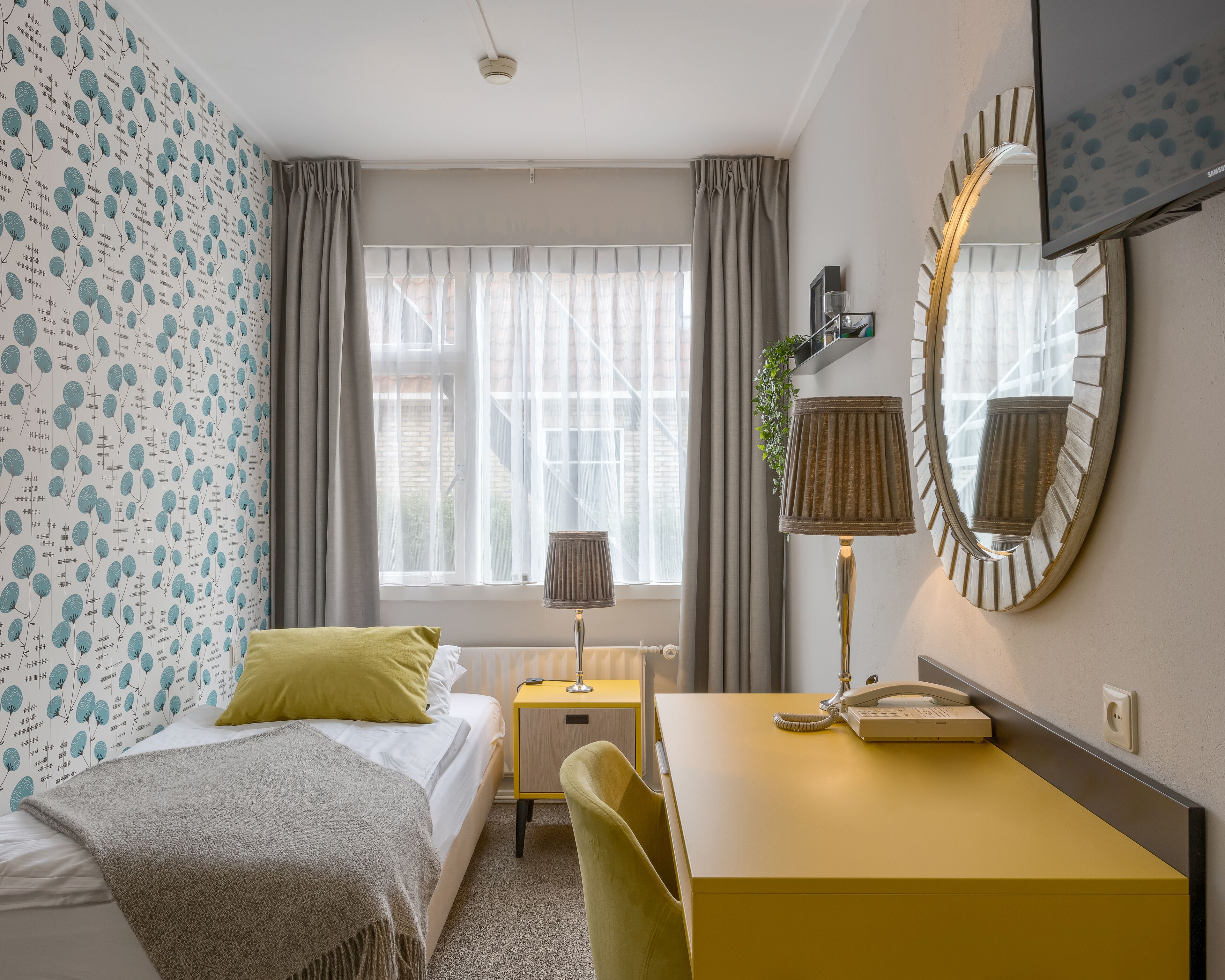 standard single room | in-room safe, desk, blackout curtains, free wifi